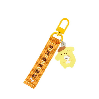 Add a touch of Sanrio charm to your accessories with this beautifully crafted embroidered keychain. Charmmy Kitty.  Pom Pom Purin.