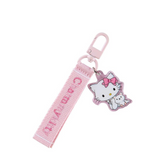 Add a touch of Sanrio charm to your accessories with this beautifully crafted embroidered keychain. Charmmy Kitty.