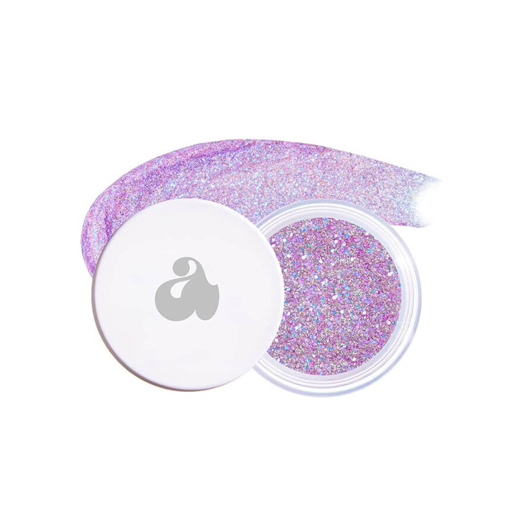 Glitter Gel is a cruelty-free, vegan gel that offers long-lasting shimmer with a buildable formula for face, body, and hair purple 07